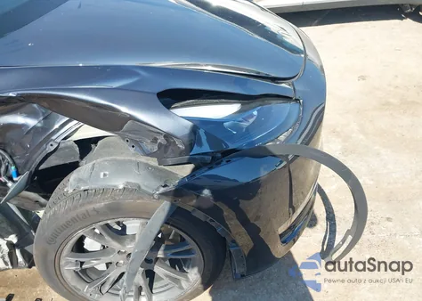 2025 Tesla Model Y Long Range Dual Motor All-Wheel Drive z USA, uszkodzony, nr VIN 7SAYGDEE9SF248703